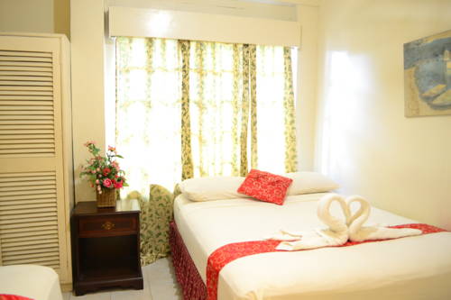Puerto Princesa Filipinas Ahorros con código de descuento para hoteles en Booking.com